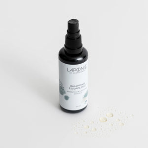 Laponie Balancing Essence Mist with clear product swatch sprayed onto the surface
